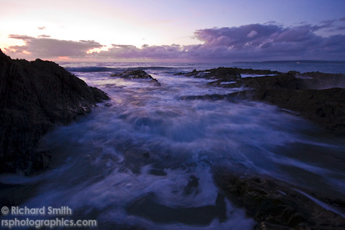 sunset sea water purple tide devon flowing