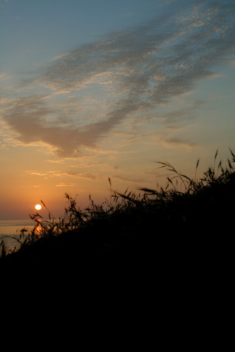 ocean sea sky grass silhouette clouds sunrise