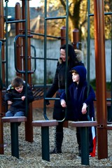boys with their grandma on the hallinan playground  … 
