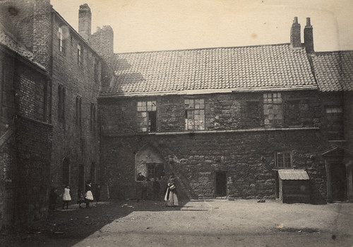 An old photograph of Blackfriars Friary in Newcastle upon Tyne from 1885, showing the building looking very dilapidated.