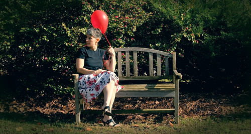 red woman black green floral bench mom gorgeous mother northcarolina skirt foliage nostalgia heels bushes redballoon rockymount astic balloonseries eos5dmarkii kathysunderman rednostalgia