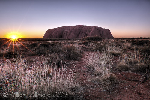 sun sunlight rock sunrise dawn sand nt australia dirt flare uluru arid daybreak northernterritory spinifex ulurukatatjutanationalpark