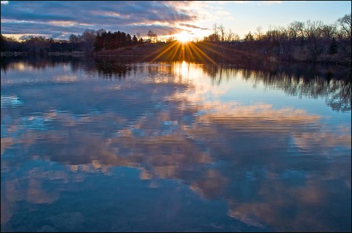 lake reflection sunrise sunburst loafers