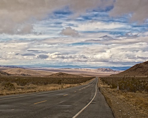 road travel tourism clouds landscape day desert time outdoor tourist southerncalifornia visualart stormclouds mojavedesert imagetype photospecs stockcategories barstowroad