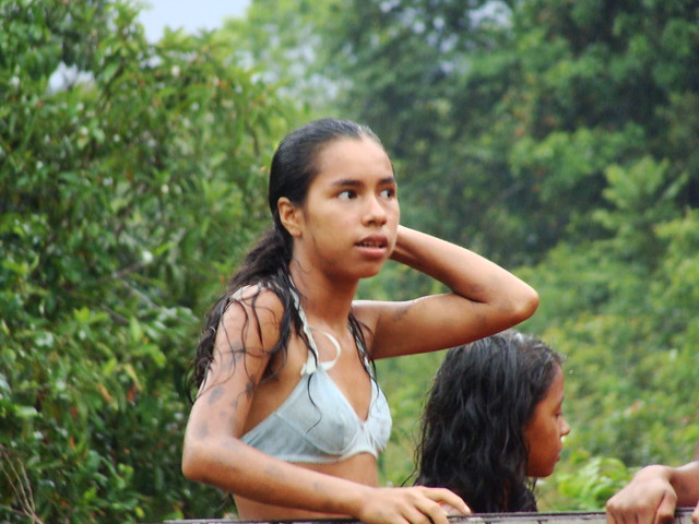 Tribal girl pulls her hair back  Flickr - Photo Sharing!