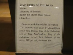 statuettes of children sign