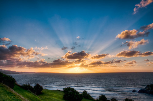 blue sunset sea sky sun beach grass rays hdr clifftop newplymouth backbeach explored nikond90 tamron18270mm centenialdrive marksolly