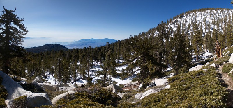 Panorama shot looking down at the snowy area below Jean Peak.