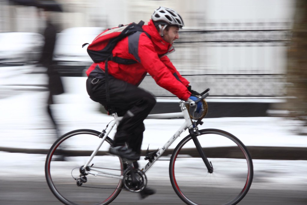 A cyclist braves the snow in west London