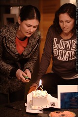 lighting the candles on neeta's birthday cake 