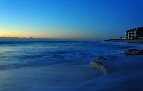 blue beach water yellow sunrise dawn nc wilmington carolinabeach fortfisher kurebeach oarnge coquinarocks