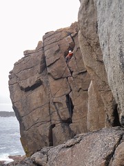 A visiting American climber tackling in Zig Zag, Sennen
