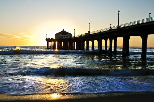 ocean california sunset sunlight beach water reflections pier movement sand waves pacific manhattan wetsand