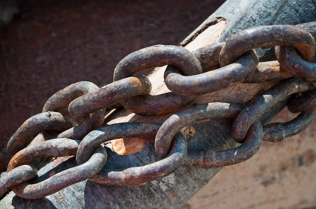 Close-up of large rusty chain links from Flickr via Wylio