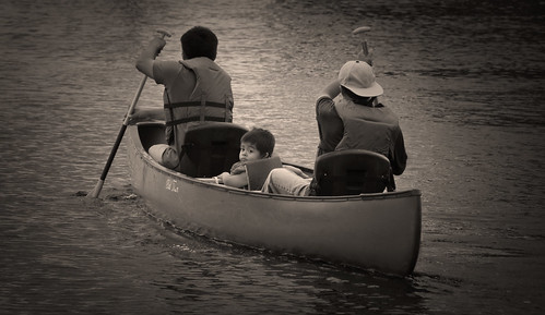 family boy sunset bw river fun outdoors boat blackwhite nikon child canoe boating passenger recreation nikkor polarizer paddling lifevest vr outing lifepreserver 18200mm ftmyersflorida manateepark d300s