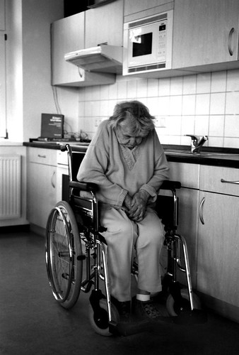 elderly woman sitting in wheelchair