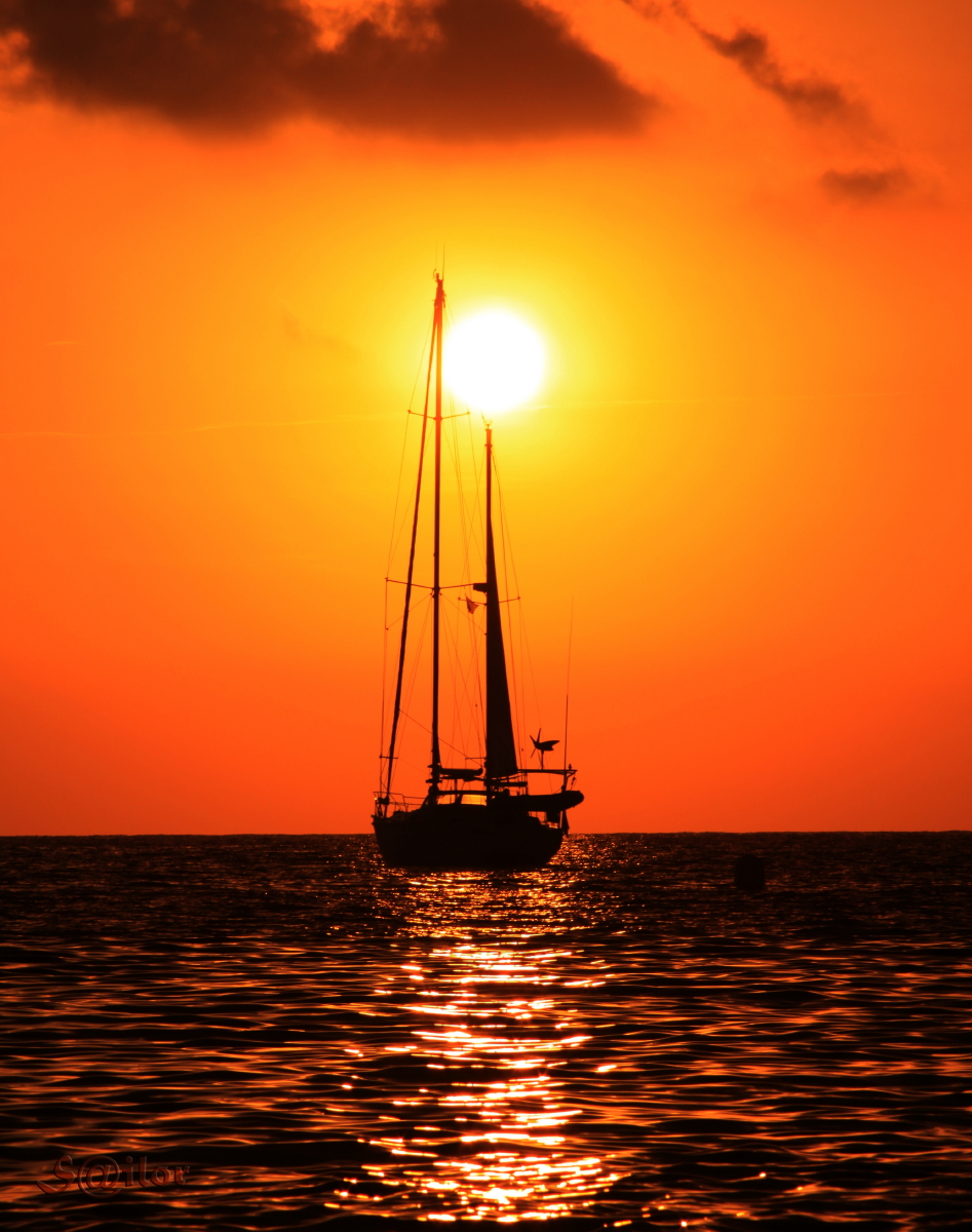 sailboat and sunset