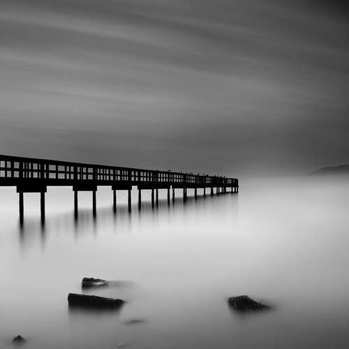 sanfrancisco california longexposure winter fog clouds contrast sunrise canon square bay pier blackwhite rocks explore lee bayarea february frontpage candlestick 2010 candlestickpoint passingtime clearingstorm ef2470f28l lucky5 5dmarkii bwnd11010stopnd gnd39