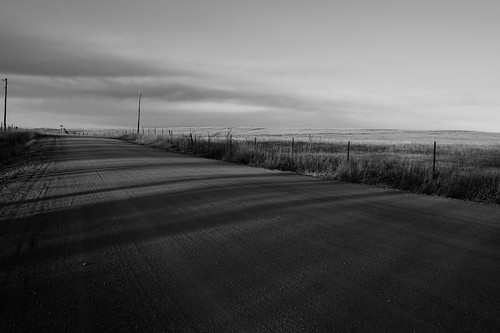 road sunset blackandwhite rural nikon shadows dirt lonely d40 1855mmf3556vr