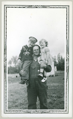 Man and two children