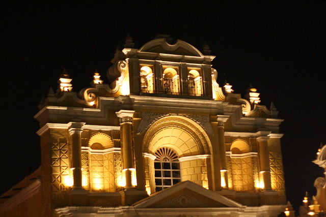 A building illuminated at night in historic Antigua