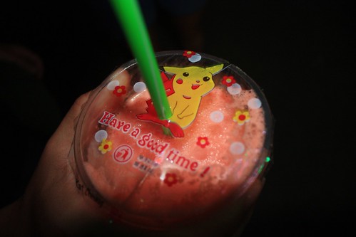 A pokemon cap… the straw inserted to… so many odd things here
