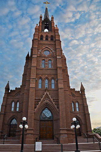 sky usa history church vertical architecture clouds facade sunrise buildings religious dawn catholic cross unitedstates cathedral religion gothic southcarolina entrance stainedglass landmark front architectural historic steeple christian charleston historical brownstone daybreak motherchurch stjohnthebaptist cathedralofstjohnthebaptist dioceseofcharleston