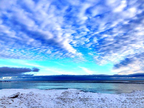 blue sky lake ice clouds freezing