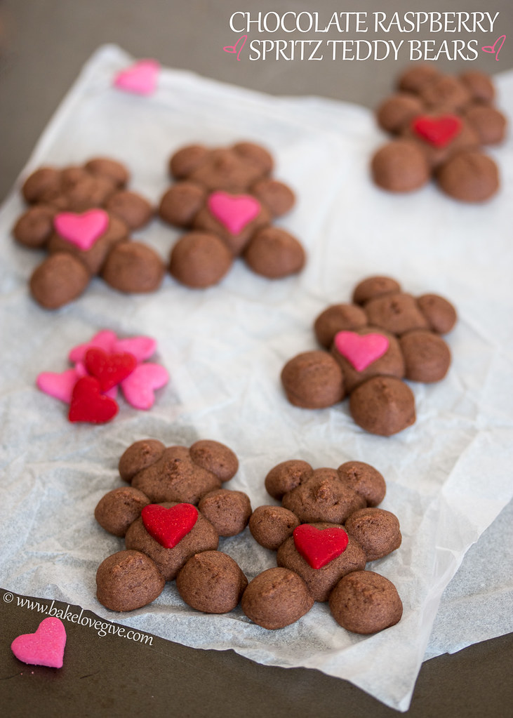 Say 'I love you' with Chocolate Raspberry Spritz Teddy Bears. A cookie press and heart-shaped sprinkles make it easy to create dozens of adorable teddy bear cookies ready to spread joy this Valentine's Day.