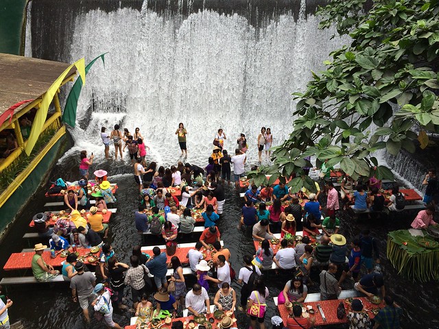 Villa Escudero waterfall dining area
