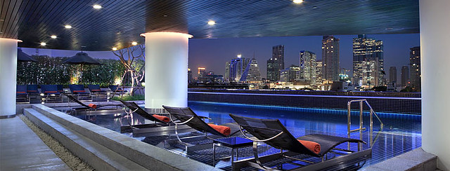 Pullman Hotel Bangkok G Swimming Pool at night overlooking the city
