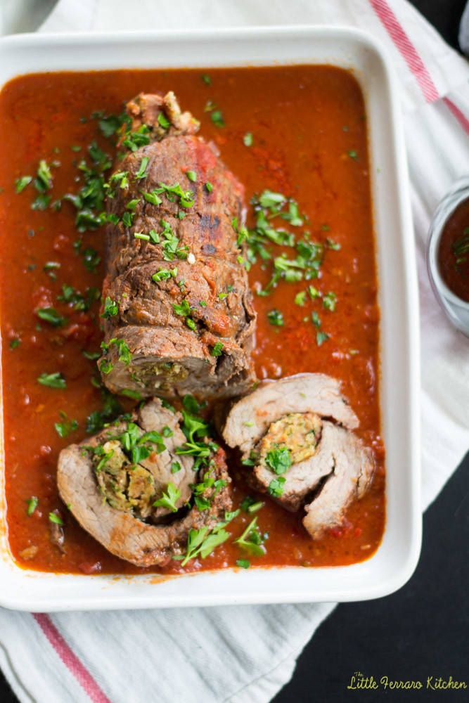 A traditional Italian dish, beef braciole recipe is a flank steak wrapped with prosciutto and Parmesan and slowly braised in a hearty marinara.