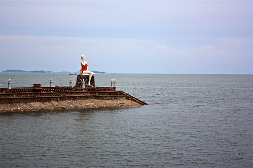 The "mermaid" statue of Kep. Locals give her clothing because they deem her undecent