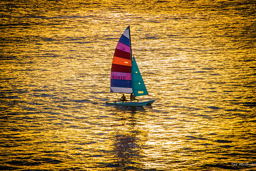 ocean travel sunset shadow water sailboat mexico boat sailing sails pacificocean zihuatanejo settingsun zihuatanejobay tedsphotos zihuatanejoguerrero bahiazihuatanejo