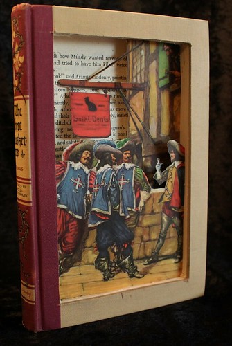 The Three Musketeers book sculpture