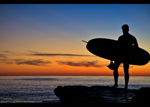 sunsetcliffs sunset summer silhouette surf surfboard water surfing surfer ocean sport beach sea orange sun board travel sunrise people vacation tropical recreation wave colorful young extreme adventure male holiday lifestyle coast horizon coastline freedom tranquil weather watersports athlete outdoor cool pacific scenic background shorebreak seashore longboard tourism fitness usa pointloma sandiego california samantoniophotography