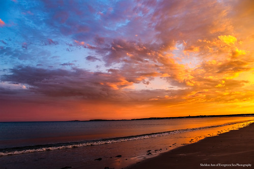 goose rocks beach maine sun sunset colorful pink blue orange rainbow sand water waves clouds sky