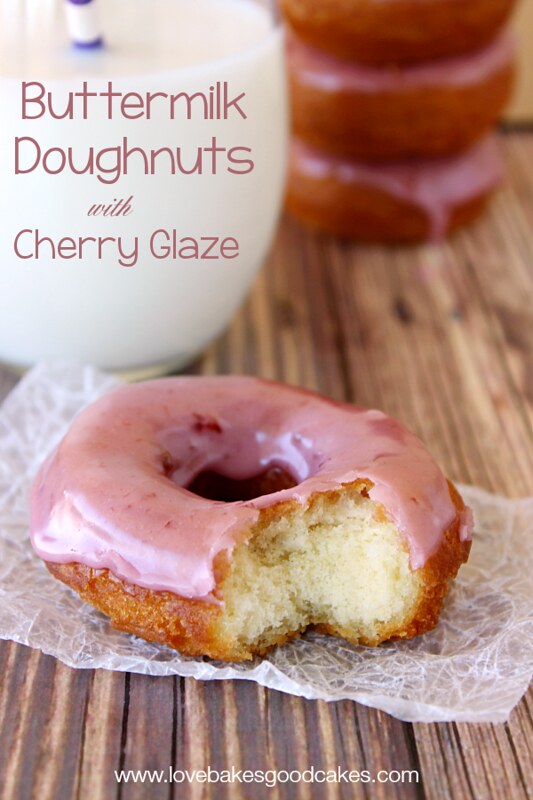 Buttermilk Doughnuts with Cherry Glaze with a glass of milk.