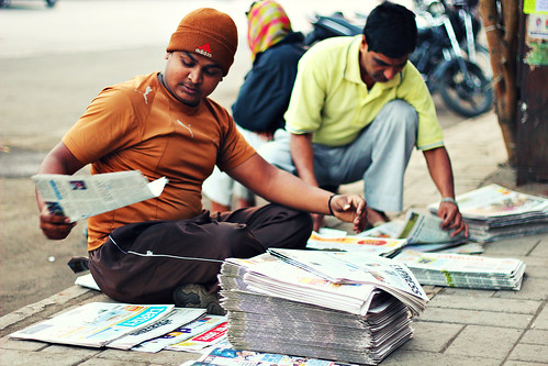 street morning india man newspapers streetportrait stall indians roadside hazy pune streetview newspapervendor sellingnewspaper