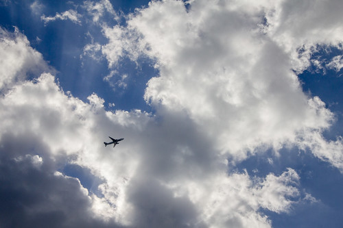 travel blue sky silhouette clouds airplane fluffy