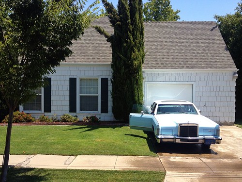 city blue urban home beauty grass car yard landscape afternoon view mercury lawn scenic continental grill driveway chrome lincoln americana parked passenger roadside stockton classy babyblue opendoor highroller neirghborhood