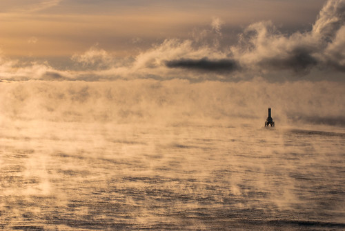 lighthouse fog sunrise lakemichigan portwashington articseafog
