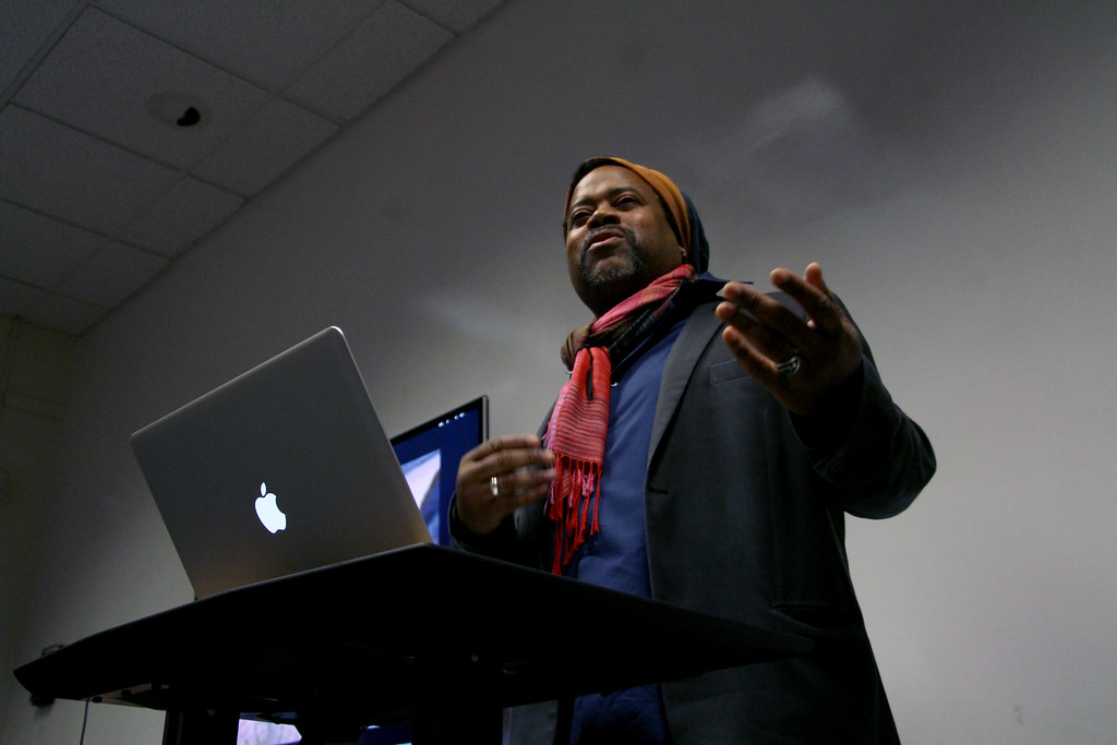 Greg Tate, a writer and musician, answers a student's question on the state of hip-hop at an event held by the Africana Studies department, on black arts and Afrofuturism, in SF State's Ethnic Studies and Psychology building, Monday, Feb. 17th, 2014. Photo by Gavin McIntyre / Xpress