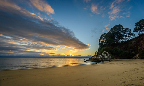 light newzealand sky water clouds sunrise dawn sand rocks day cloudy tide tasman kaiteriteri