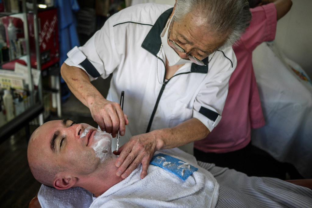 Getting a haricut the oldschool way by an 81 year old barber in Haboro Town, Hokkaido, Japan