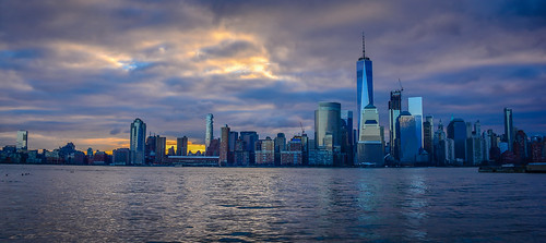 jerseycity newjersey unitedstates us lower manhattan skyline with one world trade center new york city ny sunrise usa america nyc newyorkcity newyork skyscraper skyscrapers office building buildings river hudson water am morning dawn lobster clouds cloudy overcast