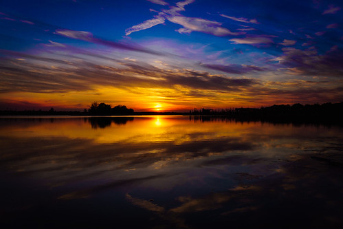sunset lake sun reflections reflectoin sony alpha6500 a6500 sigma 19mm memphis tenn skies