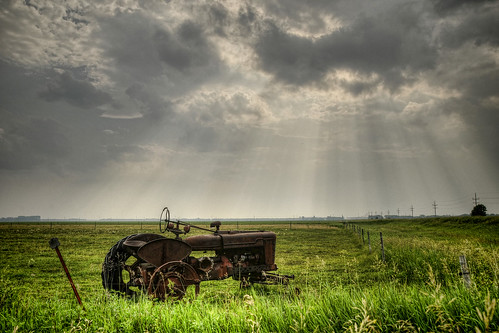 old summer tractor canada field clouds outdoors manitoba prairies sunbeams d300
