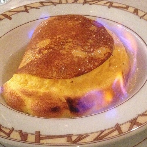 So this is a crepe stuffed with pumpkin soufflé batter, baked, then doused with orange liqueur and set on fire.