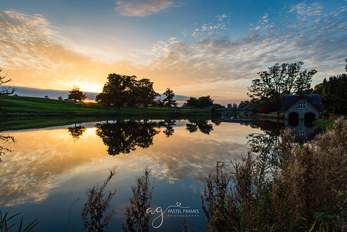 sunset ireland lake reflections trees travel travelphotography sky clouds canon5dmark3 kildare landscape landscapephotography cartonhouse maynooth canon 2470mm nature sightseeing beauty boat house grass sun autumn